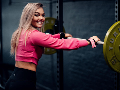 Happy woman working out for hormone health