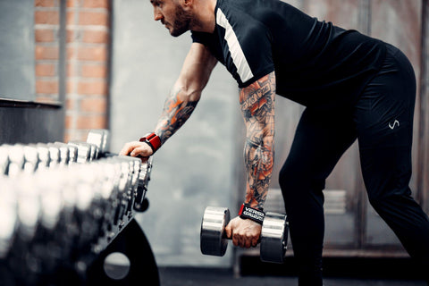 Man strength training for better sleep using Versa Gripps
