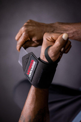 Putting Versa Wrapps lifting wraps on