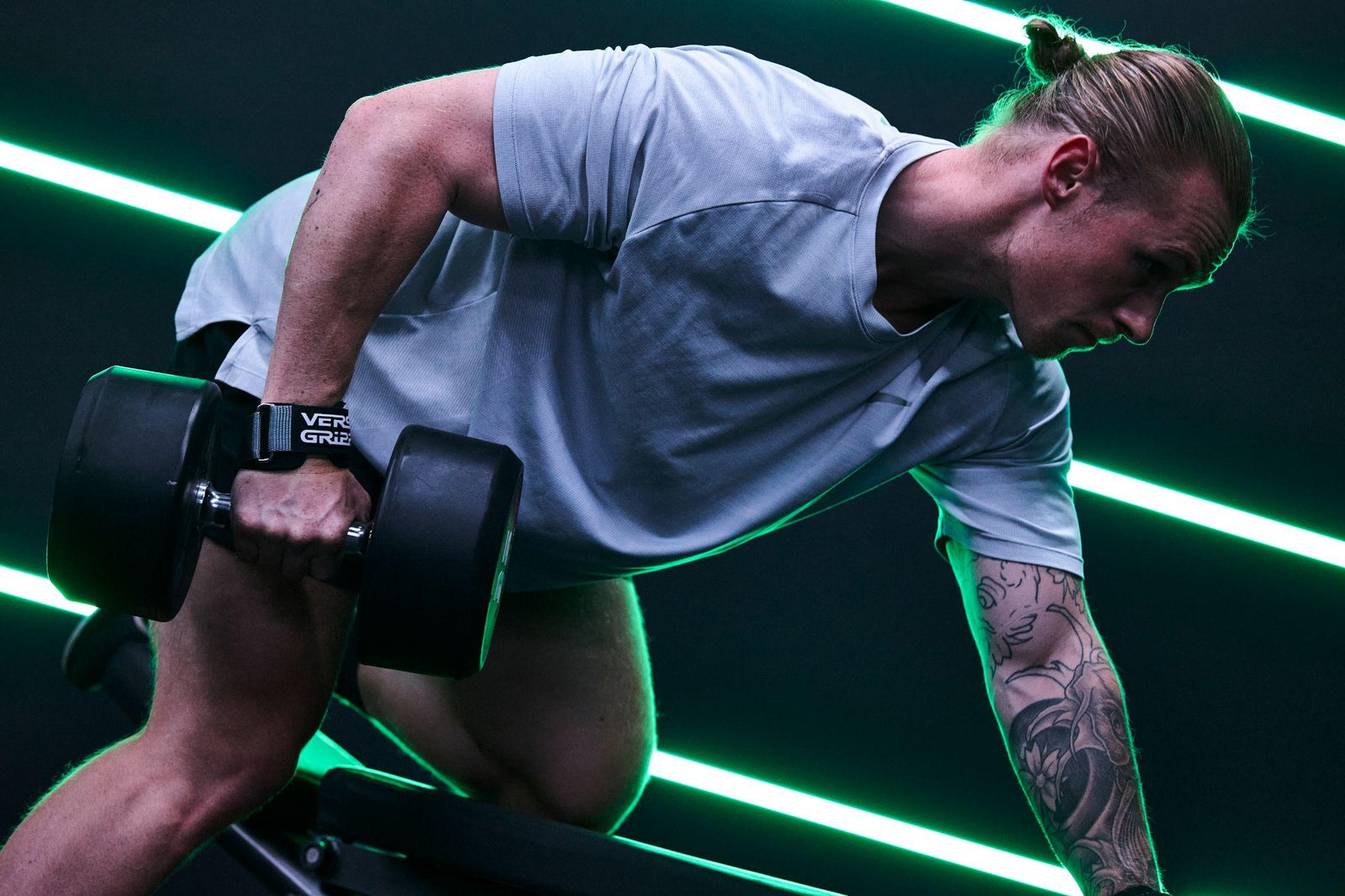 Weightlifter using Versa Gripps in the gym